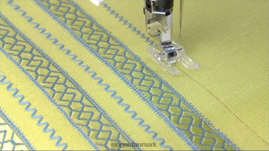 SINGER klar trykfod med åben tå til se91-seriens sy- og broderimaskiner tilbehør 26J46V137